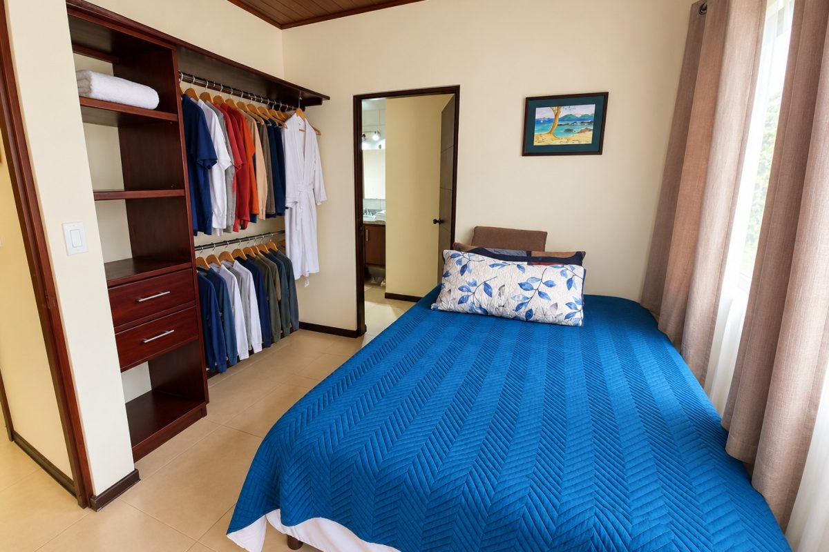 Bright-Tidy-Bedroom-with-Open-Wardrobe