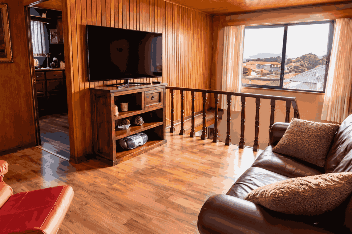 Cozy-Wood-Paneled-Family-Room_6_11zon